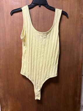 Ribbed Scoop-Neck Bodysuit in Pale Yellow